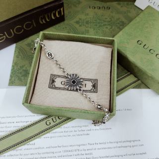 Gucci GG Floral Cross Charm Silver Chain Bracelet