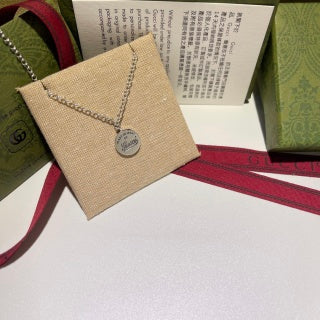 Gucci Round Logo Engraved Medallion Necklace