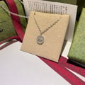 Gucci Round Logo Engraved Medallion Necklace