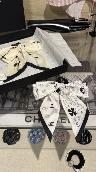 Chanel Double-Sided Bow Hair Tie with Heart and Four-Leaf Clover Motifs
