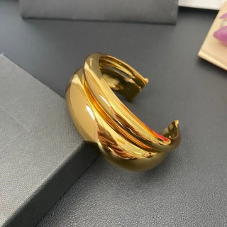 YSL Fluid Gold Sculptural Cuff Bracelet
