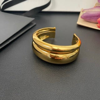 YSL Fluid Gold Sculptural Cuff Bracelet