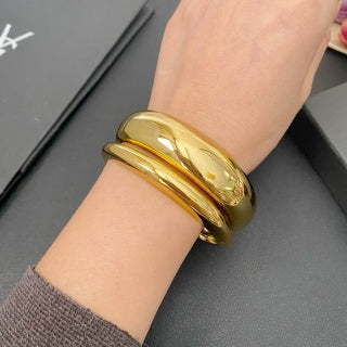 YSL Fluid Gold Sculptural Cuff Bracelet