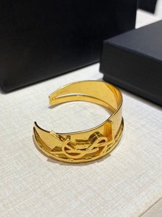 YSL Wide Gold Monogram Panel Cuff Bracelet