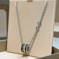 Bvlgari Silver Black Circle Pendant Necklace – Elegant Luxury Jewelry