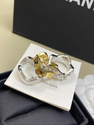 CHANEL Gold and Silver Two-Tone Wave Ring