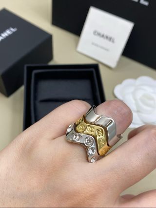CHANEL Gold and Silver Two-Tone Wave Ring