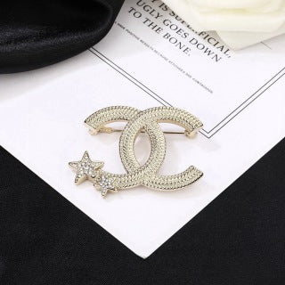 CHANEL Celestial CC Star Accent Brooch