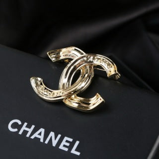 CHANEL Golden Orbit CC Sculptural Brooch