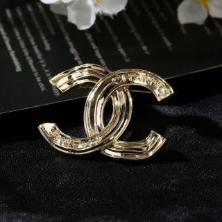 CHANEL Golden Orbit CC Sculptural Brooch