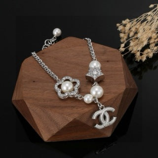 CHANEL Althea Pearl Charm Chain Bracelet
