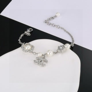 CHANEL Althea Pearl Charm Chain Bracelet