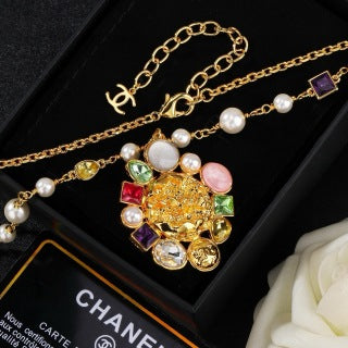 CHANEL Elaraine Pearl Charm Long Necklace