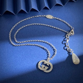 Gucci Interlocking G Crystal Medallion Necklace