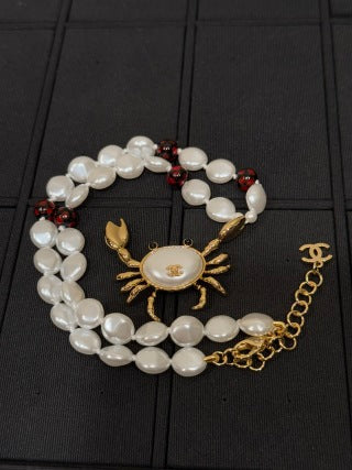 CHANEL Soleil Pearl Charm Necklace