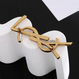 YSL Twisted Rope Monogram Gold Brooch