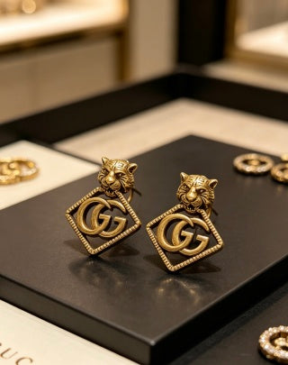 Gucci Interlocking G Lion Head Geometric Stud Earrings