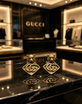 Gucci Interlocking G Lion Head Geometric Stud Earrings