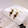 Dior Pearl Obsidian Medallion Drop Stud Earrings