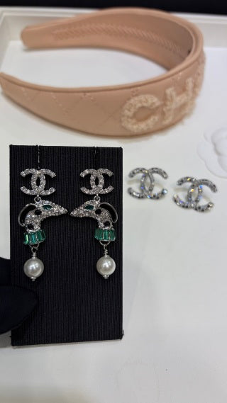Chanel Silver Pearl Earrings with Dog Motif and Full Pavé Diamonds