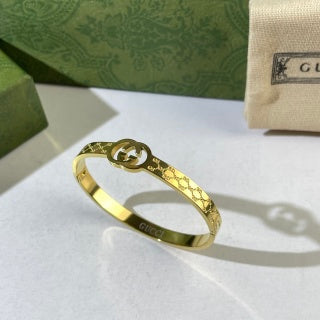 Gucci GG Monogram Engraved Cuff Bracelet