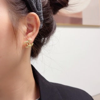 CHANEL Radiant Loop CC Stud Earrings
