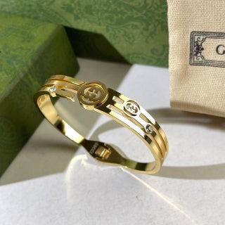 Gucci Interlocking G Round Medallion Double Band Cuff Bracelet