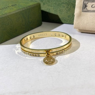 Gucci Interlocking G Hanging Medallion Pavé Cuff Bracelet