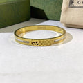 Gucci Textured GG Pattern Crystal Accent Slim Cuff Bracelet