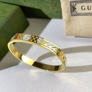 Gucci Web Stripe Interlocking G Engraved Plaque Cuff Bracelet