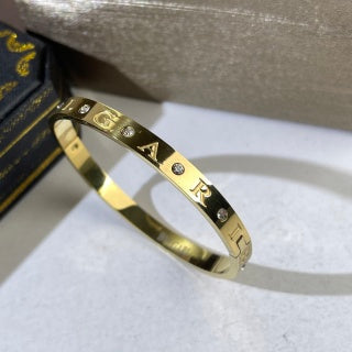 Bvlgari Two Tone Letter Detail Cuff Bracelet – Elegant Luxury Jewelry