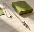 Gucci Engraved GG Spike Pendant Necklace
