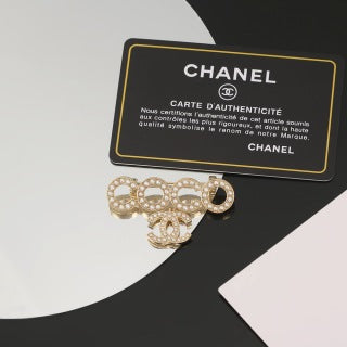 Chanel Geometric Circle Signature Brooch