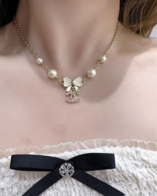 Chanel Pearl Bow Charm Necklace