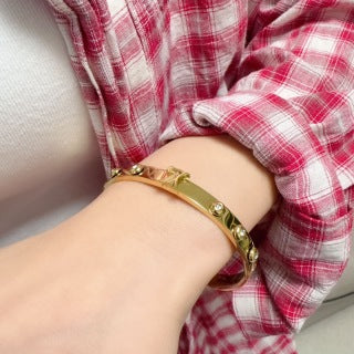 Louis Vuitton Iconic Studded Lock Cuff Bracelet