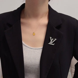 Louis Vuitton Diamond Monogram Logo Brooch