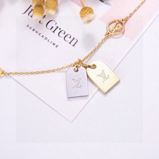 Louis Vuitton Duo Tag Charm Bracelet