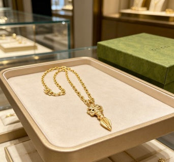 Gucci GG Engraved Spike Drop Gold Pendant Necklace