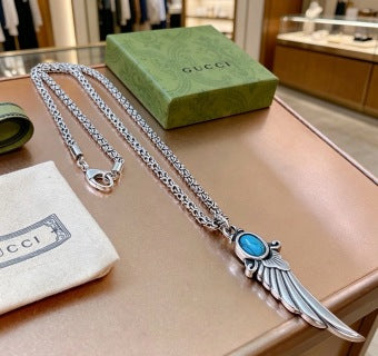 Gucci Blue Stone Winged Spike Pendant Silver Necklace