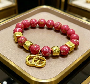 Gucci GG Red Bead Charm Gold Bracelet