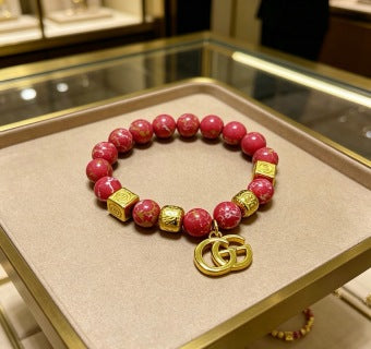 Gucci GG Red Bead Charm Gold Bracelet