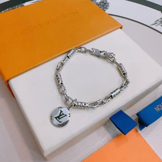Louis Vuitton Engraved Link Medallion Bracelet