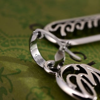 Gucci GG Engraved Oval Drop Silver Earrings