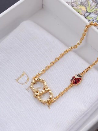 Dior Evelisse Ruby Link Charm Chain Bracelet