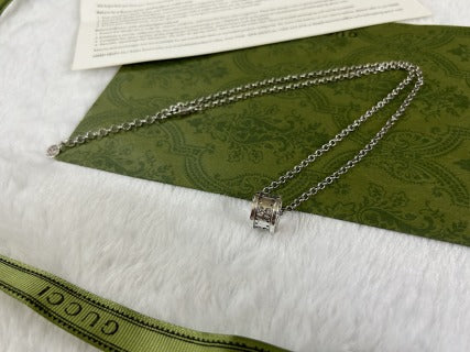 Gucci GG Barrel Engraved Silver Pendant Necklace