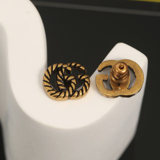 Gucci Twisted Spiral Logo Stud Earrings