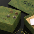 Gucci Twisted Spiral Logo Stud Earrings