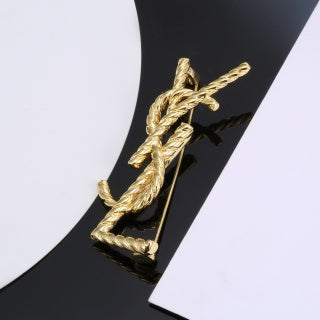 YSL Twisted Rope Monogram Gold Brooch